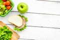 Healthy food in lunchbox for dinner at school white table background top view mockup Royalty Free Stock Photo