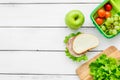 Healthy food in lunchbox for dinner at school white table background top view mockup Royalty Free Stock Photo