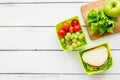 Healthy food in lunchbox for dinner at school white table background top view mockup Royalty Free Stock Photo