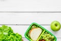 Healthy food in lunchbox for dinner at school white table background top view mockup Royalty Free Stock Photo