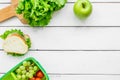 Healthy food in lunchbox for dinner at school white table background top view mockup Royalty Free Stock Photo