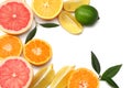 healthy food. mix sliced lemon, green lime, orange, mandarin and grapefruit with green leaf isolated on white background top view Royalty Free Stock Photo