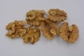 Healthy food, natural nuts, walnuts arranged on a white background.