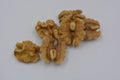 Healthy food, natural nuts, walnuts arranged on a white background.