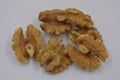 Healthy food, natural nuts, walnuts arranged on a white background.