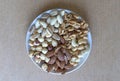 Healthy food. Nuts mix assortment on white grey table top view. Collection of different legumes for background image close up nuts Royalty Free Stock Photo