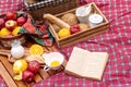 Healthy food relaxing time concept. Picnic basket has a lot of fresh fruit apple and orange with bread, Royalty Free Stock Photo