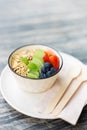 Healthy food rich vitamin and fiber morning meal bowl. colorful mix berry fruity with cereal whole grain food vertical shot