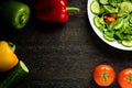 Salad vegetables: tomatoes, fresh pepper and cucumber. Concept for a tasty and healthy meal.Vitamins in vegetables and herbs for i Royalty Free Stock Photo