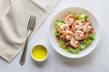 Healthy food shrimp salad lettuce carrot tomato in bowl on wood background Royalty Free Stock Photo