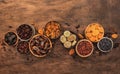 Healthy food snack: sun dried organic mix of dried fruits: apricots, figs, raisins, dates, and other on wooden table, top view Royalty Free Stock Photo