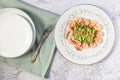 Healthy food stir fried shrimp asparagus in plate on white slate table