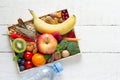 Healthy food on tray on white wooden background, balanced diet concept and healthy lifestyle