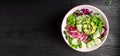 Healthy food. Vegetarian buddha bowl. watermelon radish, avocado, lettuce, microgreen cucumber and radish salad, Top view. Flat
