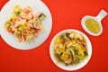 Healthy food. Vegetarian slates on a white plate. salad of crab, cucumber, corn, tomato and lettuce on a colored background Royalty Free Stock Photo