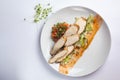 Healthy food on a white plate and a white background