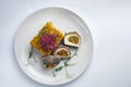 Healthy food on a white plate and a white background