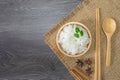 Healthy food, White rice, cooked white rice, cooked plain rice in wooden bowl with cinnamon and star anise, spoon and chopsticks, Royalty Free Stock Photo