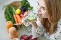 Healthy food woman. Beautiful woman eats a salad.