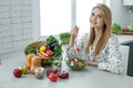 Healthy food woman. Beautiful woman eats a salad.