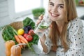 Healthy food woman. Beautiful woman eats a salad.