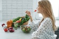 Healthy food woman. Beautiful woman eats a salad.