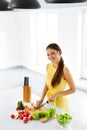 Healthy Food. Woman Cutting Vegetables. Salad, Food Preparation. Royalty Free Stock Photo