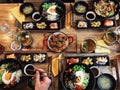 Healthy food on wooden table. Top view. people having dinner in the restauran