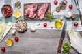 Healthy foods, cooking concept pork steak with vegetables,knife, fruits, spices, laid out frame place for text, on wooden rusti