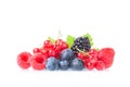 Healthy fresh food berries group. Macro shot of fresh raspberries, blueberries, blackberries, red currant and blackberry with leav Royalty Free Stock Photo