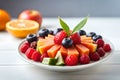 Healthy fresh fruit salad in bowl, Low calorie tasty dessert concept Royalty Free Stock Photo