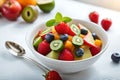 Healthy fresh fruit salad in bowl, Low calorie tasty dessert concept Royalty Free Stock Photo