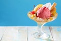 Healthy fresh fruit salad with creamy ice-cream Royalty Free Stock Photo