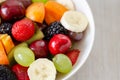 Healthy fresh fruit salad in white plate. Top view. Royalty Free Stock Photo