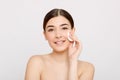 Healthy fresh girl removing makeup from her face with cotton pad Royalty Free Stock Photo