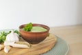 Healthy fresh green chutney sauce. With fresh mint pudina and yogurt. Spicy indian cuisine. Served on brown bowl with Royalty Free Stock Photo