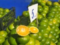 Healthy fresh green mandarins on the countertop at local vegetable bazaar