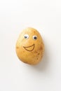 Healthy fresh happy potato with eyes and mouth isolated background