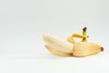 Healthy , fresh, opened banana on white background.