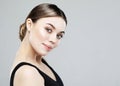 Healthy fresh skin face, beautiful woman close up face with clean skin over grey background Royalty Free Stock Photo