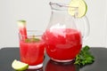 Healthy fresh smoothie drink from red watermelon, lime, mint and ice drift Royalty Free Stock Photo