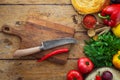 Fresh vegetables and healthy ingredients, knife on cutting board Royalty Free Stock Photo