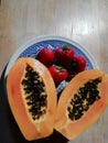 Healthy fruit breakfast of papaya and strawberries Royalty Free Stock Photo
