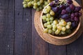 Healthy fruits Red and White wine grapes on swooden  backgrounds Royalty Free Stock Photo
