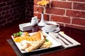 Healthy Full American Breakfast with Pancakes, Banana and toasts with butter. Food and restaurant concept