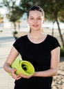 Healthy girl in black T-shirt is ready for training Royalty Free Stock Photo