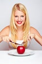 Healthy Girl eating an red apple Royalty Free Stock Photo