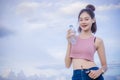 Healthy girl`s drinking water in the bottle , drink for thirstily for Refreshing Royalty Free Stock Photo