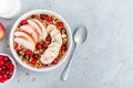 Healthy granola breakfast bowl with apple, cranberry, banana and chia seeds. Top view, copy space Royalty Free Stock Photo