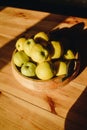 Healthy green food with apples on wood plates desk background mock up Royalty Free Stock Photo